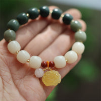 KarmaRipple's Gradient Bodhi Seed Amber Lotus Peace Bracelet