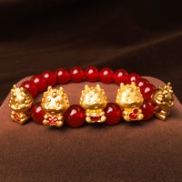 KarmaRipple's Year of the Dragon Authentic Red Agate Bronze Coin Fu Character Protection Bracelet