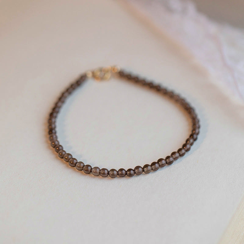 KarmaRipple's Smoky Quartz Black Obsidian Ultra-thin Beadwork Success Bracelet p1