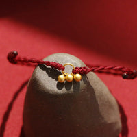 KarmaRipple's 925 Sterling Silver Gold Plated Fortune Red String Bracelet