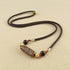 Brown Nine-Eye Dzi Bead