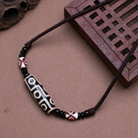 KarmaRipple's Tibetan Nine-Eye Dzi Bead Protection String Pendant